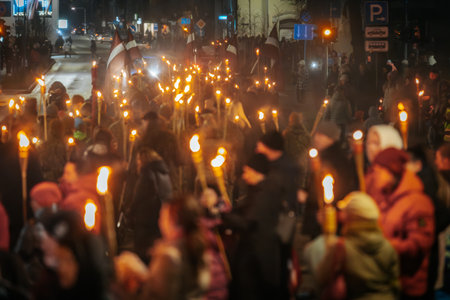 Crowd gathered in Valmiera for a torchlight procession on November 11, celebrating...
