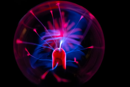 A closeup shot of an electric light ball on a black backgroundの写真素材