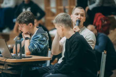 Group of students sitting in a lecture hall and listening to the teacherのeditorial素材