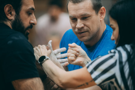 Detail of the hands of a homeless man during a demonstration held in Milan.のeditorial素材