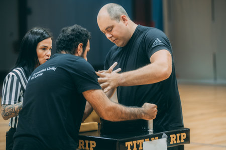 People gather outside Ferragamo fashion show building for Milan Women's Fashion Week in Milan.のeditorial素材