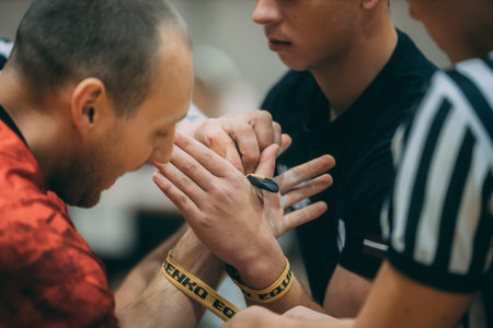 Detail of referee hands during Milan Men's Fashion Week in Milan.のeditorial素材