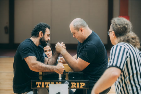 Basketball players fighting for a ball in the gym. Two men are fighting.のeditorial素材