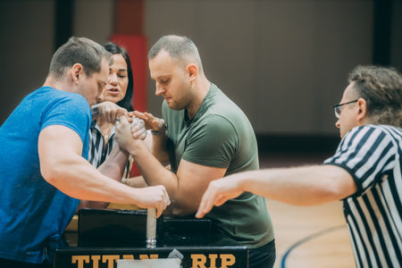 Group of friends playing basketball together at the gym. Focus on the player.のeditorial素材
