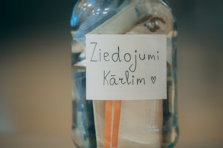 Zero waste concept. Glass jar with plastic waste and the inscription zero waste.のeditorial素材