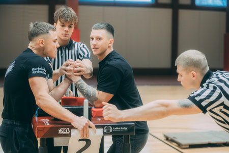 Fencing match between Ukraine and Russia in sports hallのeditorial素材