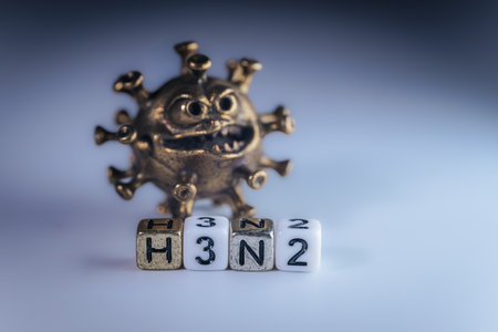 3D virus illustration with a fierce face, paired with dice showing H3N2, symbolizing health risks and the importance of disease awareness in modern societyの写真素材