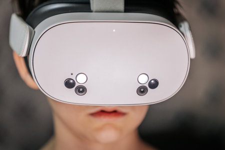 Person engaged in virtual reality experience with headset, highlighting advanced technology and...