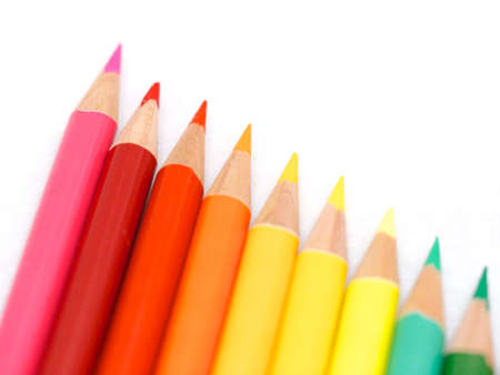 Colored pencils lined up in rainbow colorの写真素材