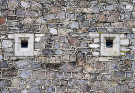 stone wall with vents in Plymouth
