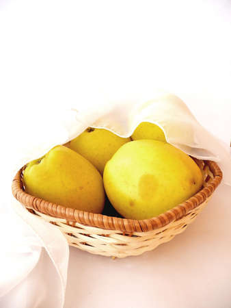 yellow apples in a cribの写真素材