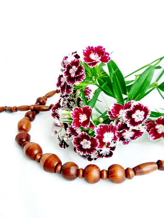 flowers and wooden beadsの写真素材