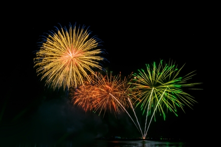 Colorful fireworks over a night sky.の写真素材