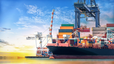 Logistics and transportation of International Container Cargo ship in the ocean at Sunset sky, Freight Transportation, Shippingの写真素材