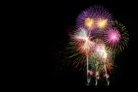 Fireworks light up the sky and copy space, abstract celebration backgroundの写真素材