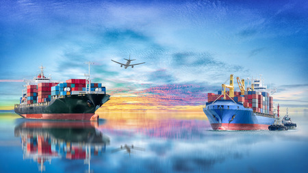 Logistics and transportation of International Container Cargo ship with tugboat and cargo plane in the ocean at twilight sky, Freight Transportation, Shippingの写真素材