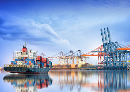 Logistics and transportation of International Container Cargo ship and cargo plane in the ocean at twilight sky, Freight Transportation, Shippingの写真素材