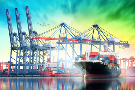 Logistics and transportation of International Container Cargo ship and Cargo plane with working crane bridge in seaport for logistic import export background and transport industry.の写真素材