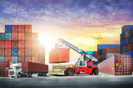 Logistics import export background and transport industry of Container Cargo freight ship at sunset...