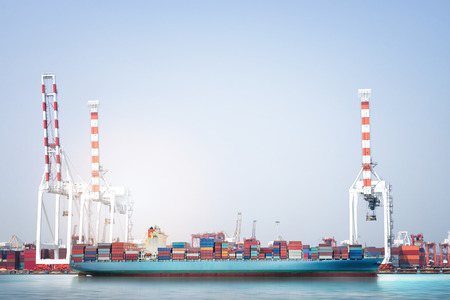 Logistics import export background of Container Cargo ship in seaport on blue sky, Freight Transportationの写真素材