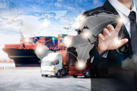 businessman touching world map screen, Global business logistics import export background and container cargo freight ship transport conceptの写真素材