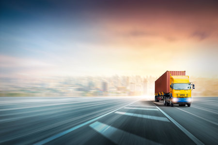 Transportation and logistics concept, Speed delivery of Container truck on highway at sunset sky with copy space, Global Business logistics import export and cargo truck transport industry backgroundの写真素材
