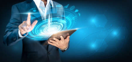 Businessman pressing on virtual screen interface and select service, Customer support center, Web online customer service, Call center, IOT internet of thing, Global business, Smart technology conceptの写真素材