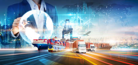 Businessman using virtual of global logistics network distribution, Smart logistics transportation import export concept, Cargo freight ship, truck at industrial port, Global business and technologyの写真素材