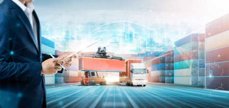 Global business network distribution of Container truck at port cargo, Businessman using tablet strategy data delivery and smart technology concept, Logistics import export transportation backgroundの写真素材