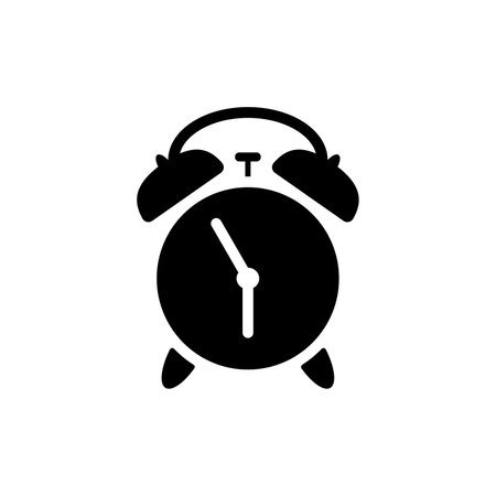Retro mechanical alarm clock silhouette. Classic clock with black dial and round bells for signal for alert and vector reminderのイラスト素材