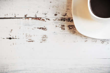 coffee cup on wood table with spaceの写真素材