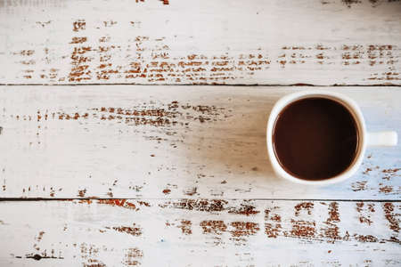 coffee cup on wood table with spaceの写真素材