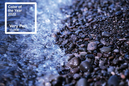 Pantone color of 2022 is Very Peri. Landscape. Sea and surf. Natural background.の写真素材