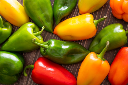 Pepper. vegetables on a wooden background, top view, flatley.の写真素材