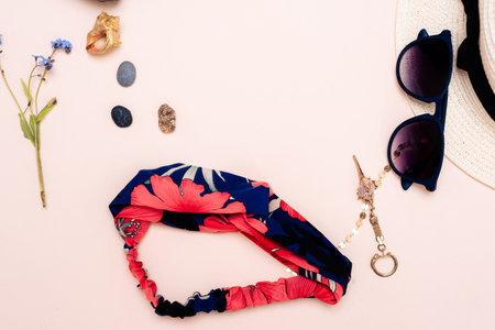 summer travel accessories. camera, hat, glasses and top view on a light background. with space for your textの写真素材