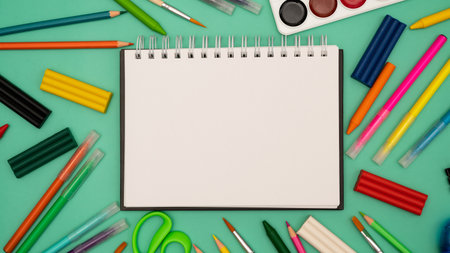 Back to school soon. buying stationery, flatlay, a place to copy your text or advertising on a white tablet. Bright background. photo 16:9の写真素材