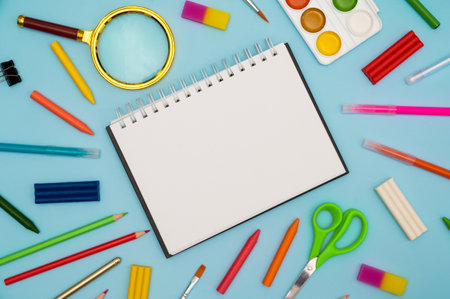 Back to school soon. buying stationery, flatlay, a place to copy your text or advertising on a white tablet. Bright background.の写真素材