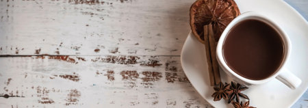 Coffee cup with spices on wooden table texture. Horizontal wide photo subtitle, cover. copy-spaceの写真素材