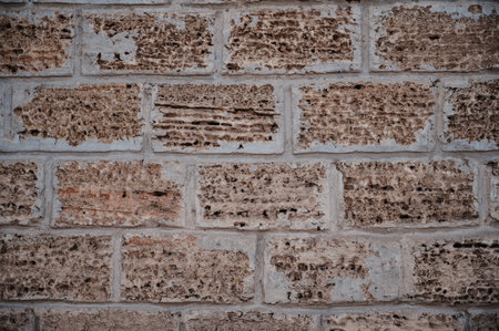 An old brick wall, the facade of the building. Abstract texture backgroundの写真素材