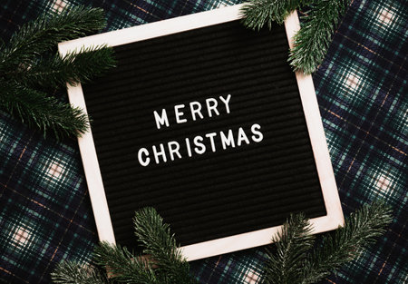 Merry Christmas message on an old vintage letter board. Top view. Flatley.の写真素材