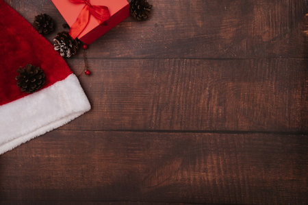 Christmas decorations made of balls, cones, and spices. The concept of celebrating the New Year. Top view. A place for your text.の写真素材