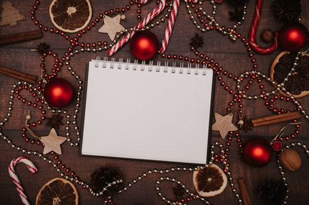 Christmas New Year paper frame, flatley style with a top view with Christmas decorations made of balls, cones, spices.の写真素材