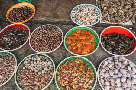 A variety of Fresh edible oysters, clams and scallops at the local market in Nha Trang, Vietnam.の写真素材