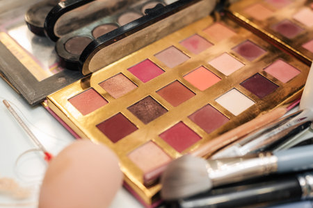 Decorative cosmetics on dressing table in makeup roomの写真素材