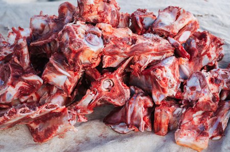 Meat on the bone on the counter at the market. soup meat set.の写真素材