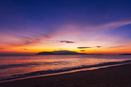 Sunrise. Clouds over the sea in the morning with orange, yellow sunlightの写真素材