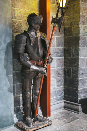 Full plate protective armor and sword of medieval warriorの写真素材