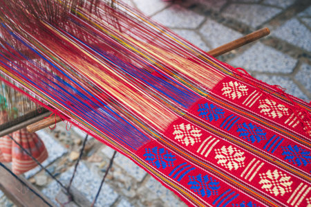weaving and making handmade fabrics. close-up of a loom.の写真素材