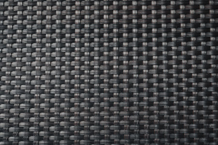 black background with rattan weave textureの写真素材