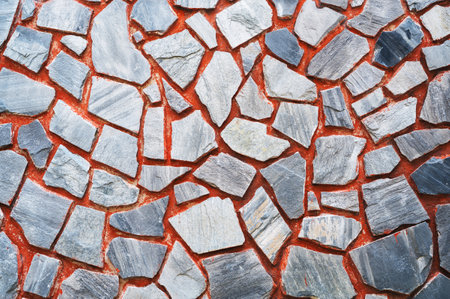 Detail of a stone wall with different size of rocks.の写真素材